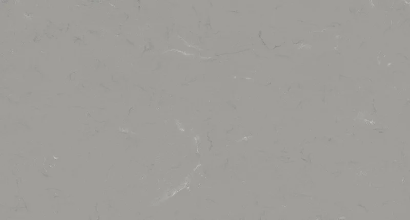 A grey benchtop material with subtle, soft white veining. Meganite Shadow Concrete