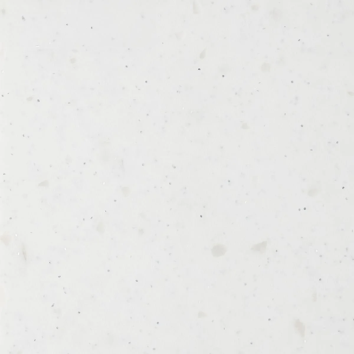 A white benchtop material with subtle light grey flecks and black specks. Meganite Ice Storm