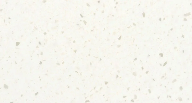 A white based benchtop material with soft grey and white flecks. Meganite Blanca Granite