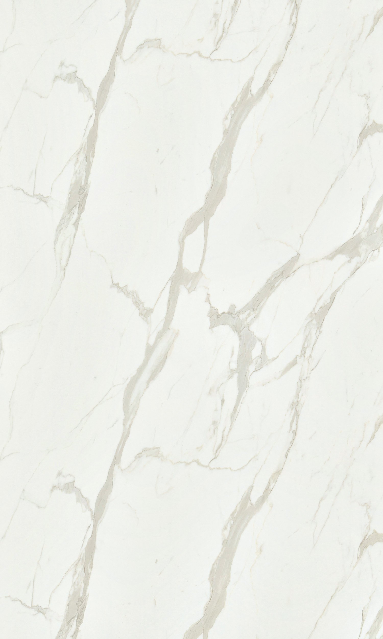 Close-up of a white marble surface with beige and light brown veining.