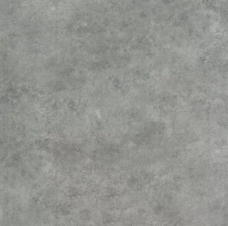 Close-up of a concrete or stone surface with a textured gray finish.