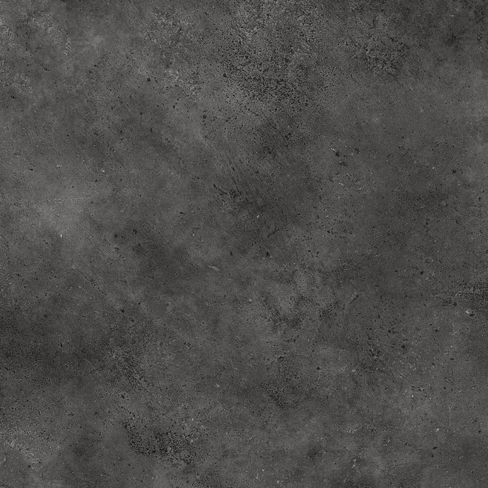 A close-up view of a dark, textured concrete surface.