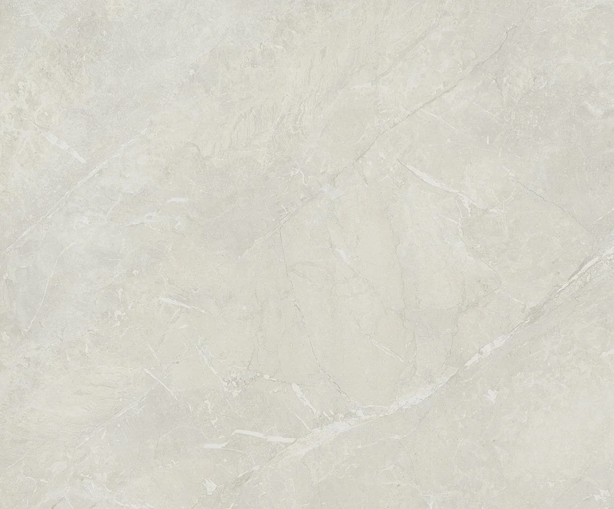 Light-colored marble surface with subtle veining and texture.
