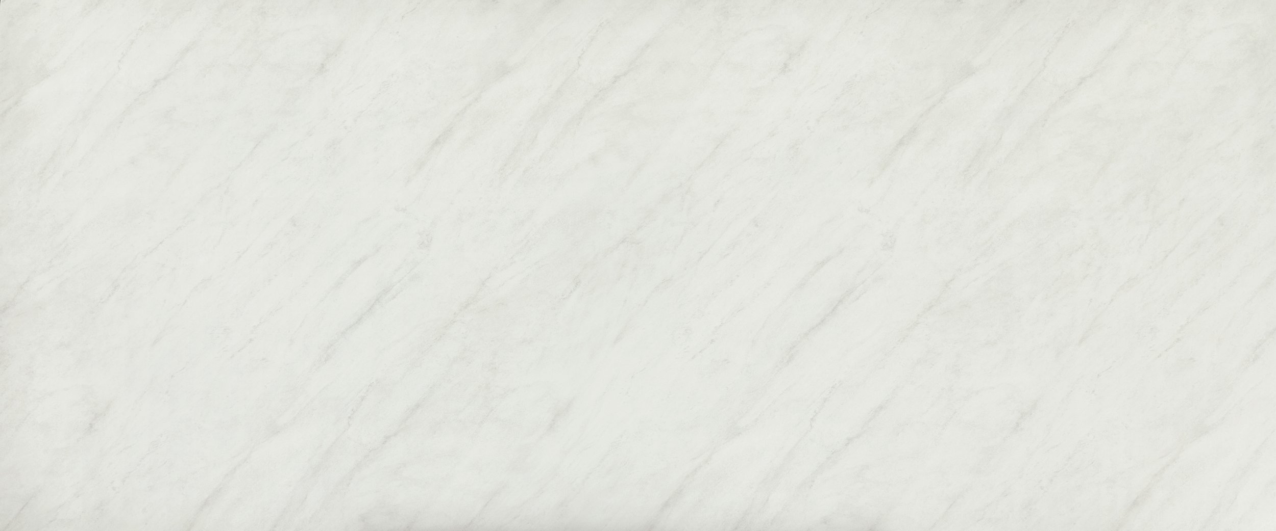 A light-colored marble surface with subtle gray veining.