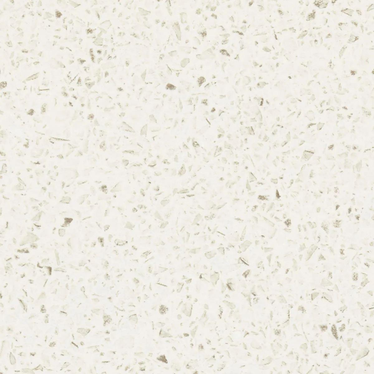 Close-up of a white wall with a textured, speckled surface.