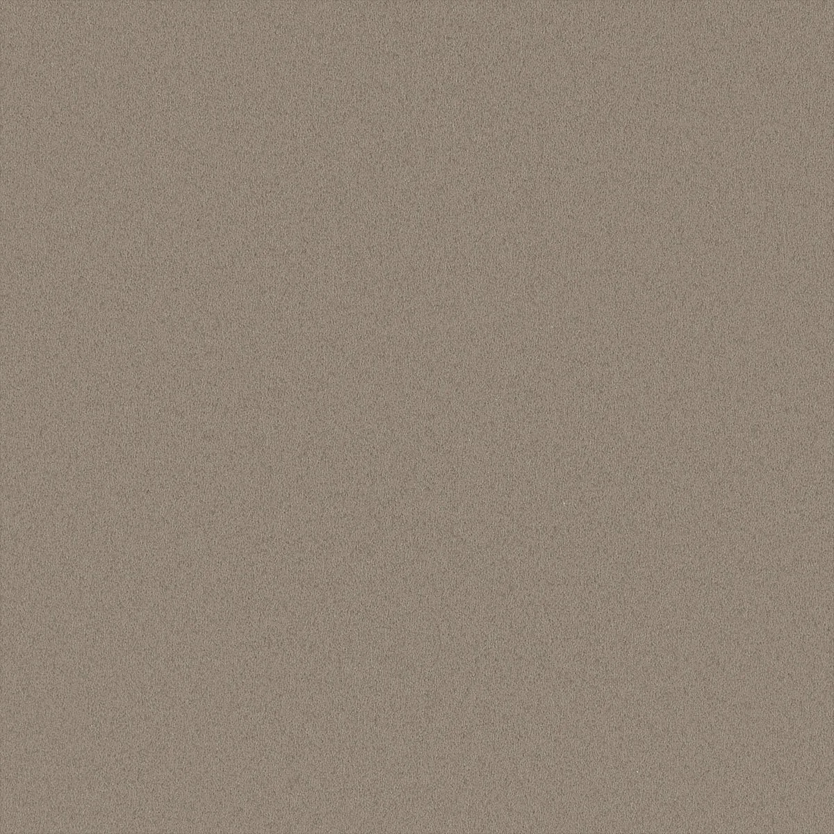 A plain, textured beige surface