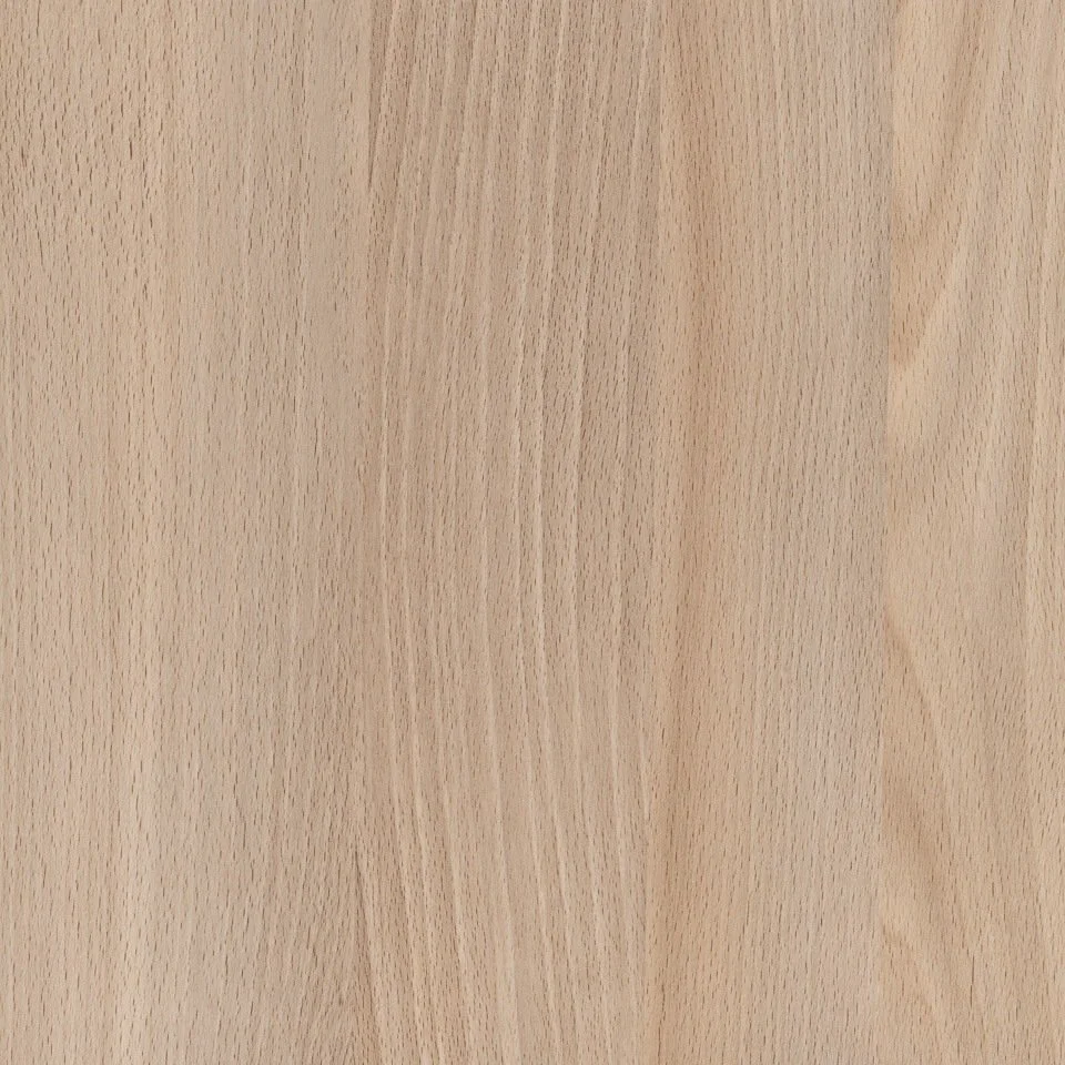 Close-up view of a light-colored wooden surface with visible grain patterns.