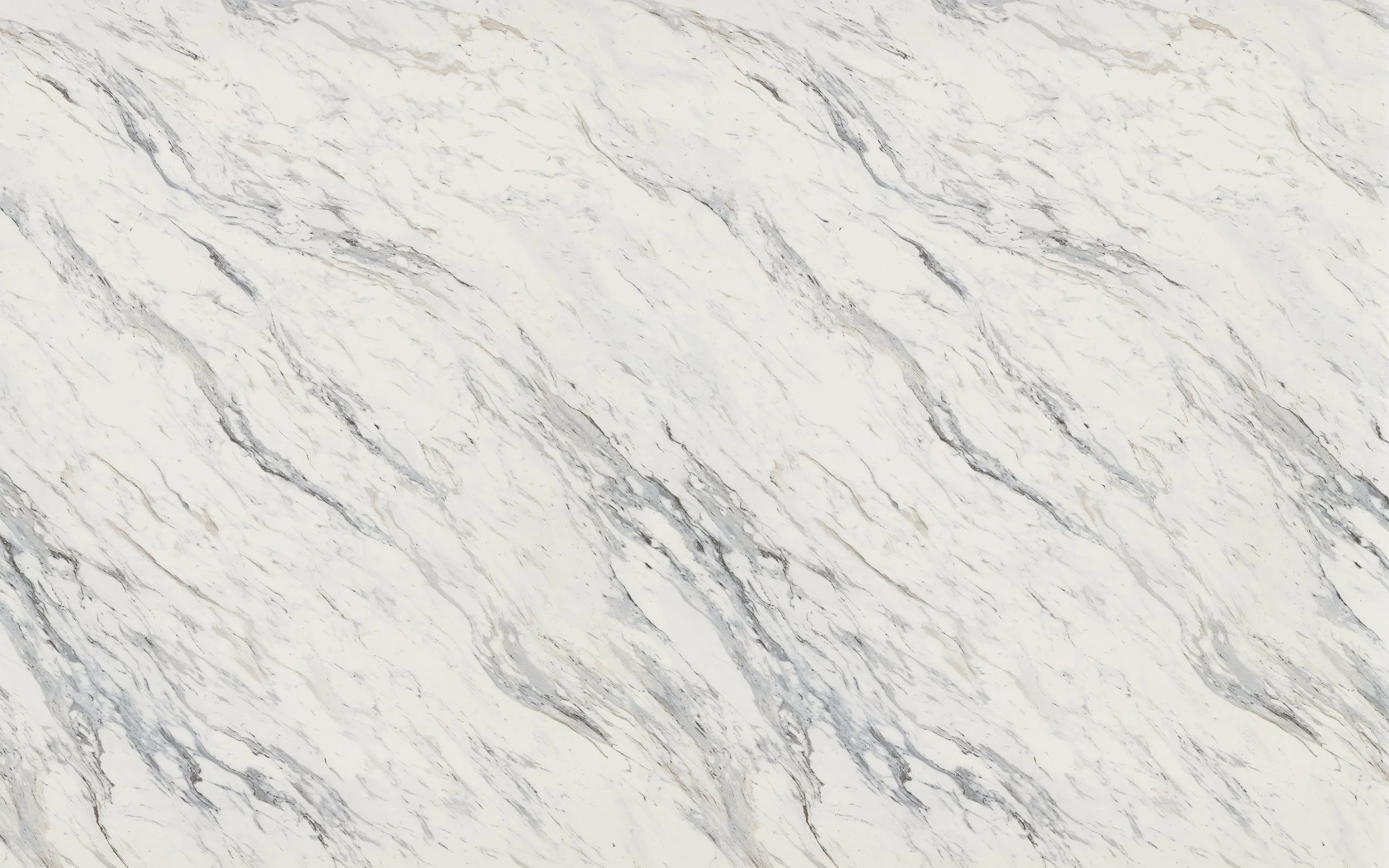 A white marble surface with grey veining.