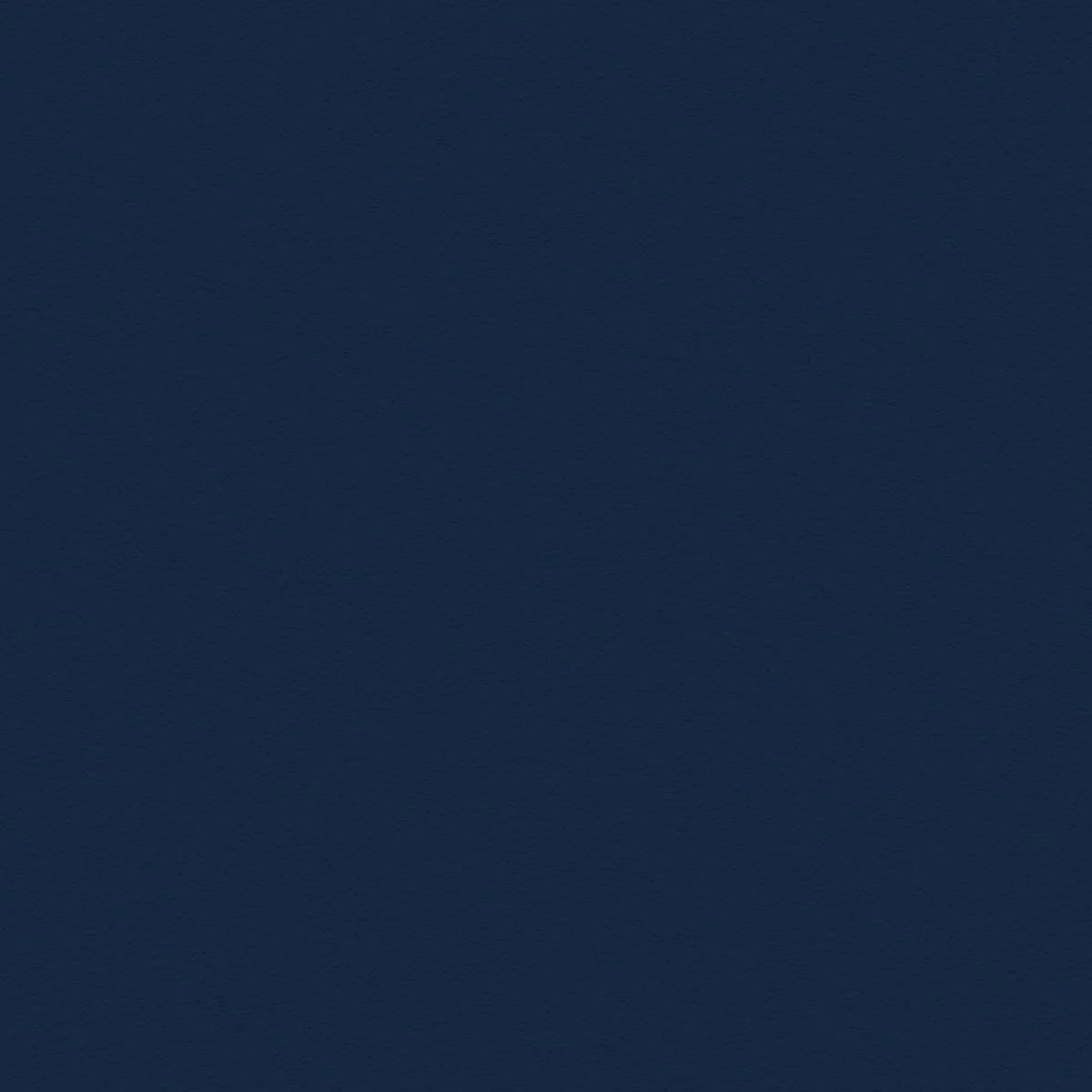 The image is a solid navy blue background with no discernible objects or features.