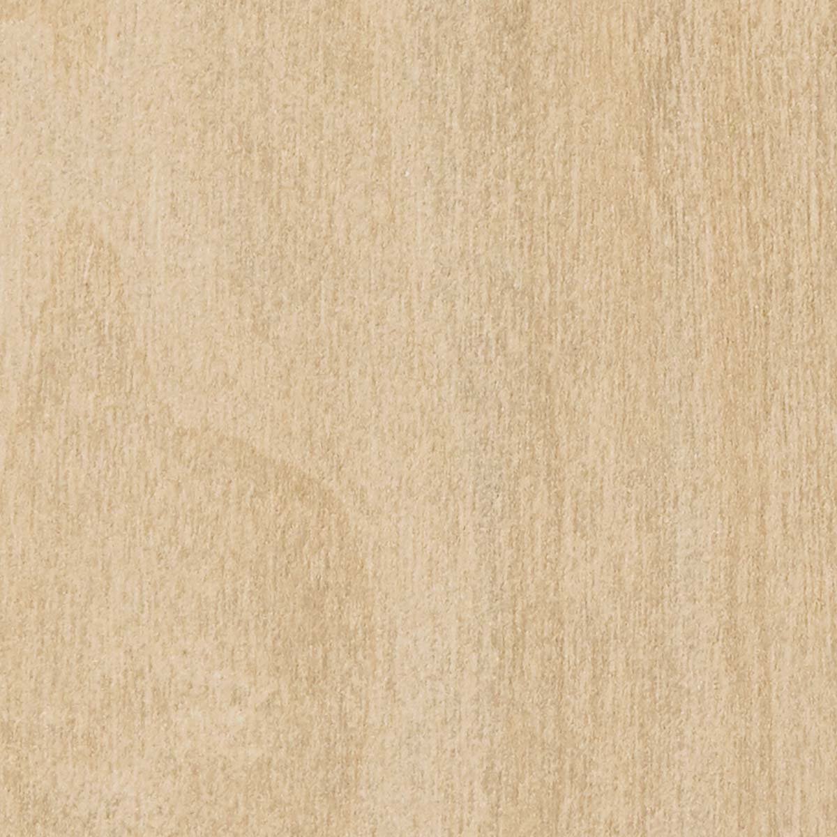 A close-up of light-colored wooden surface with visible grain and texture.