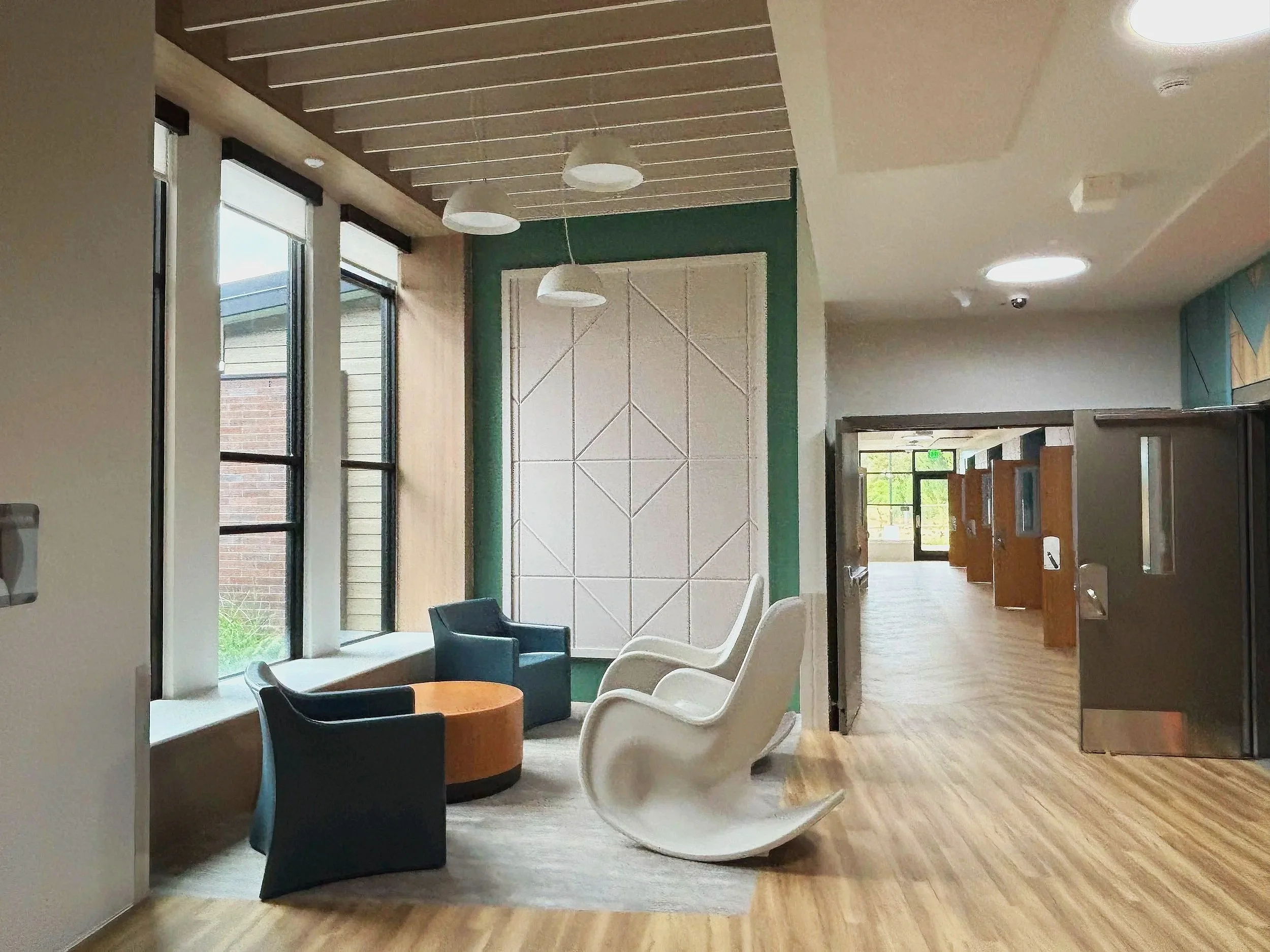 Pendant lighting installation above patient seating area
