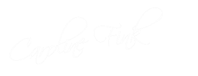 Signature text that reads 'Caroline Fink' in elegant cursive