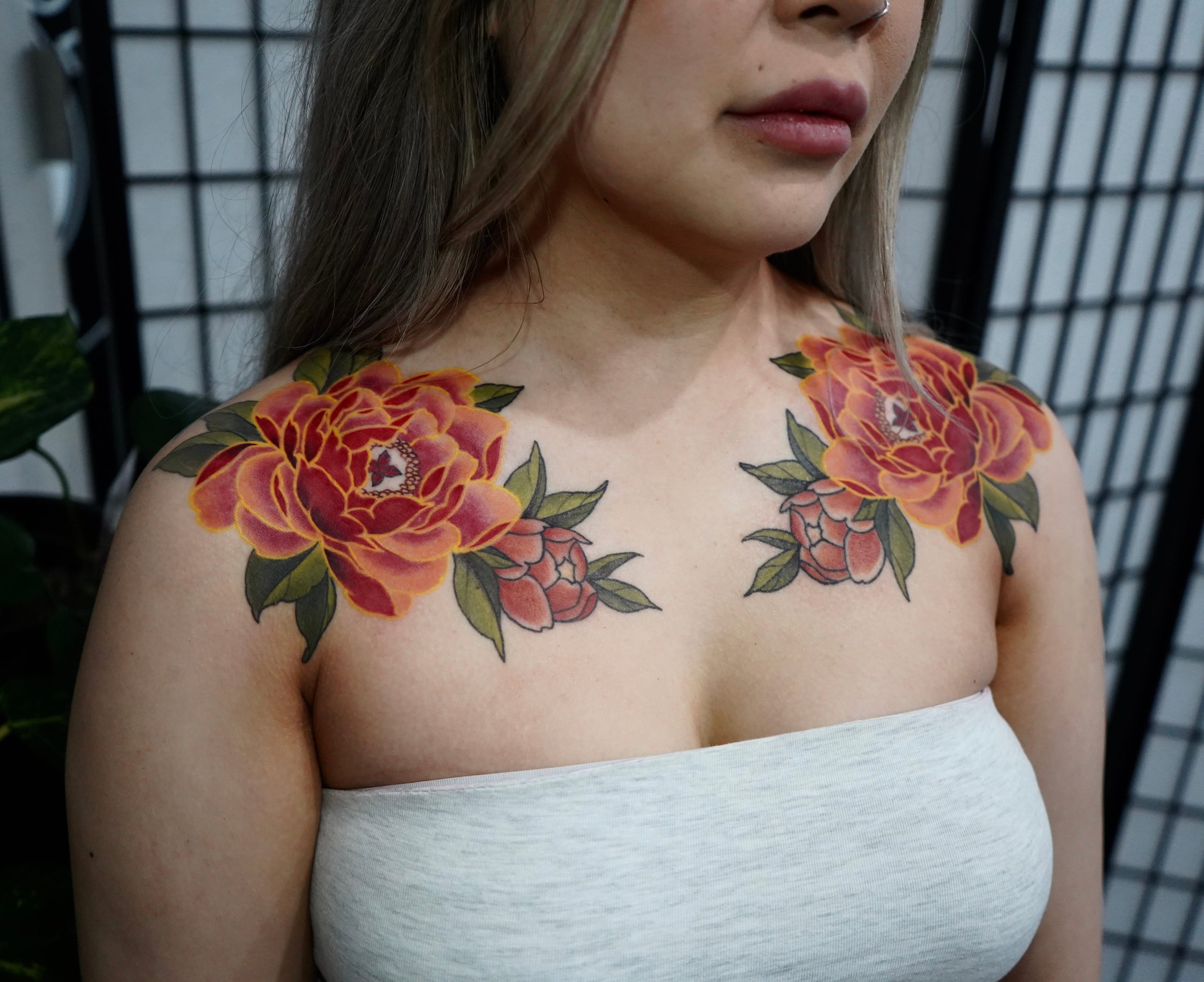 33 peony flower chest tattoo.jpg