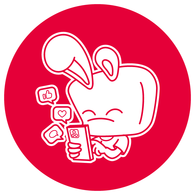 Cartoon character with a duck bill and bunny ears looking at a smartphone surrounded by social media icons like thumbs up, heart, and speech bubble on a red background.