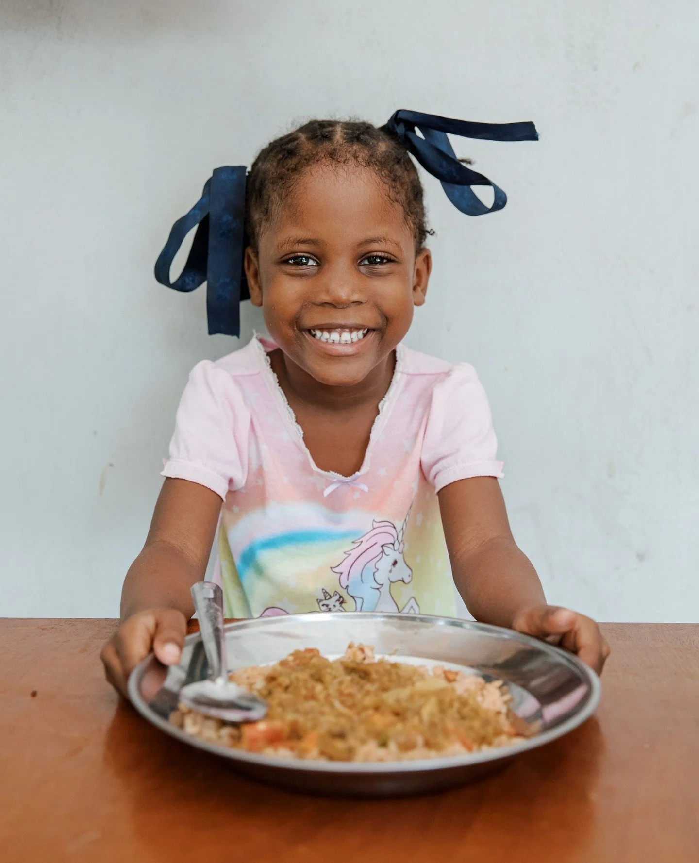 You can tell this is her favorite part of the day!⁠
Help us feed more kids!⁠
⁠
Learn more at RiceBowls.org⁠
#FightHunger #OrphanCrisis #LetsFeedMoreKids #RiceBowlsOrg