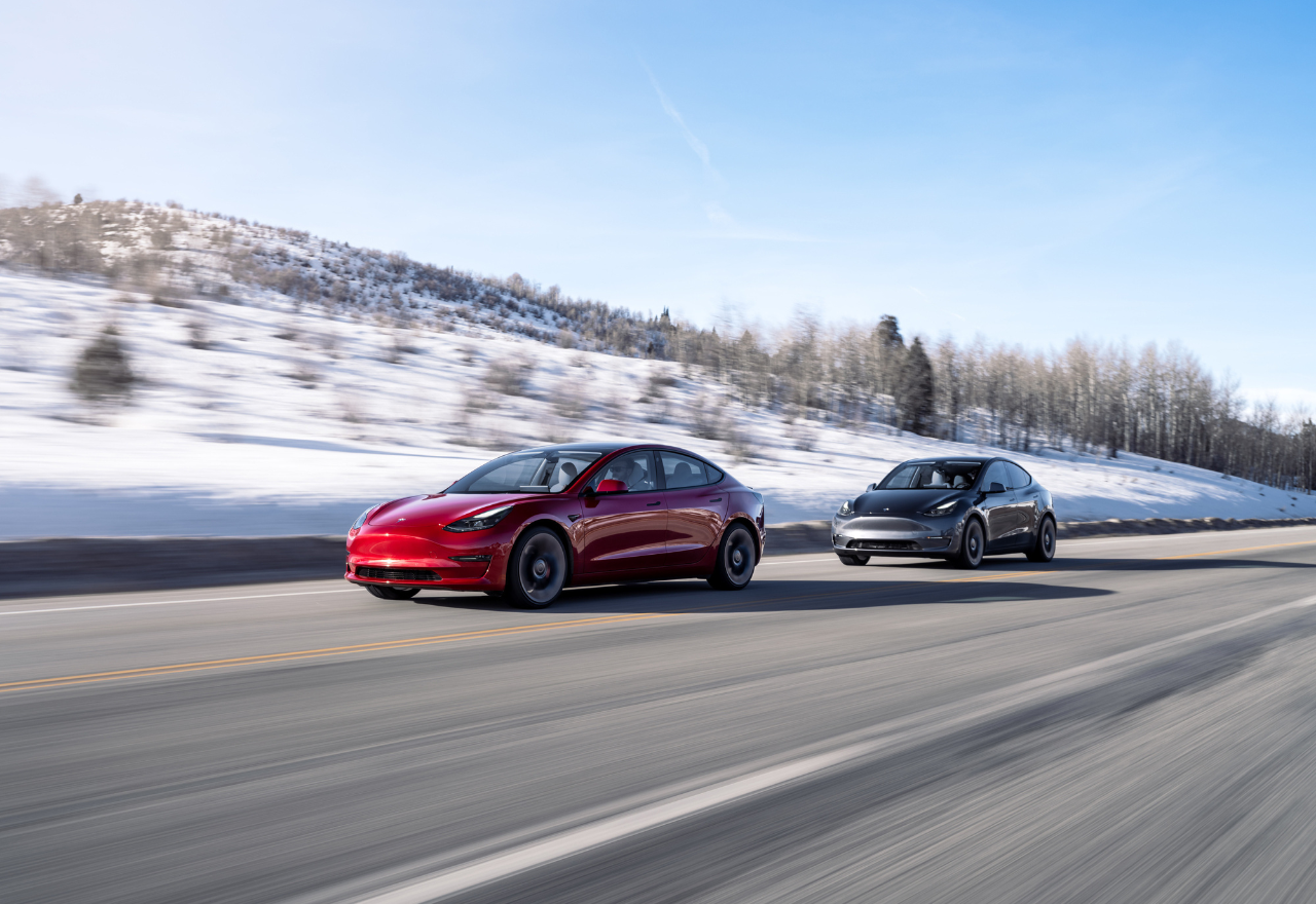 Tesla Model Y and Model 3 on the open road