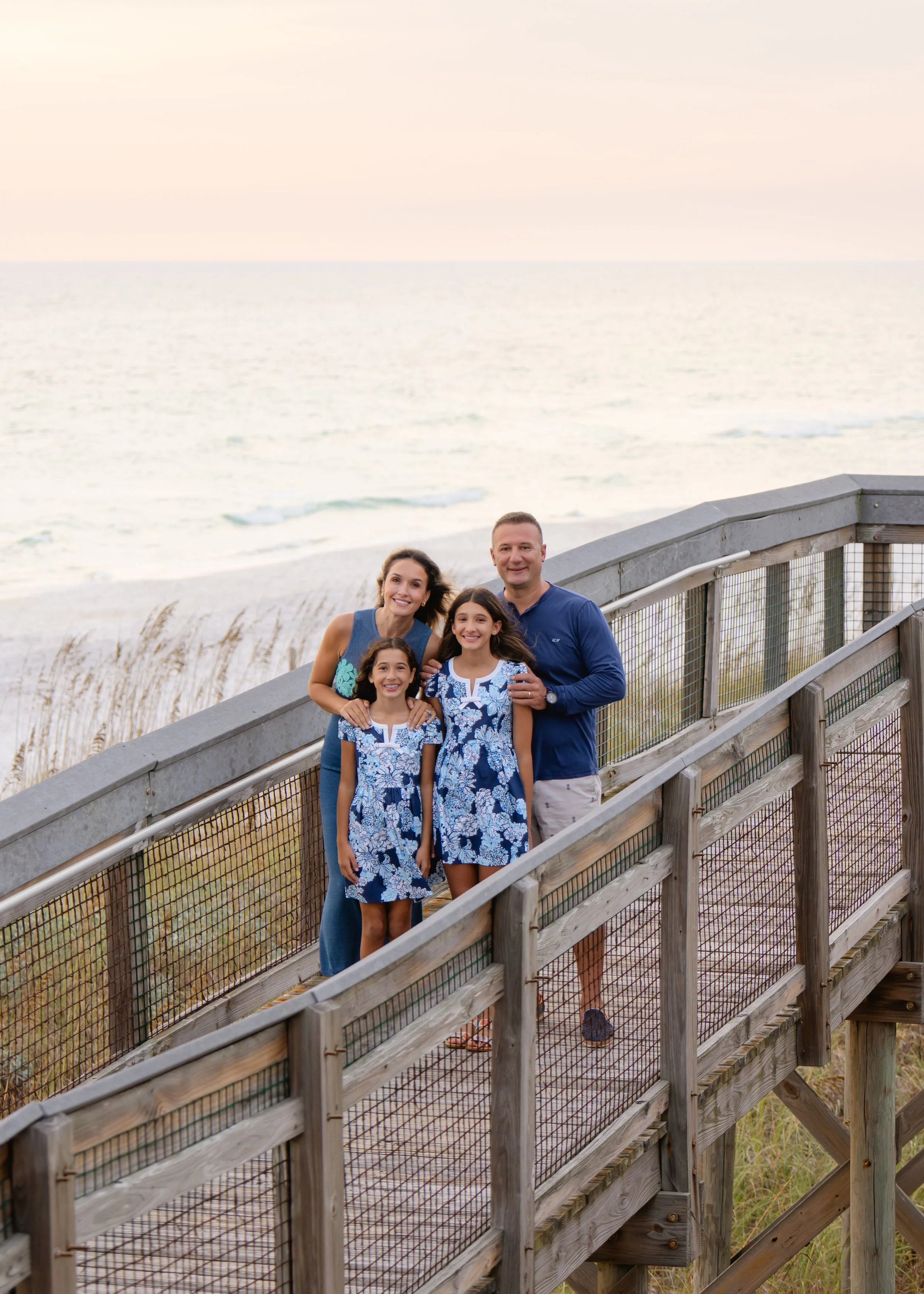 Family on board walk in Deer Lake State Park, Florida. 30A Photographer