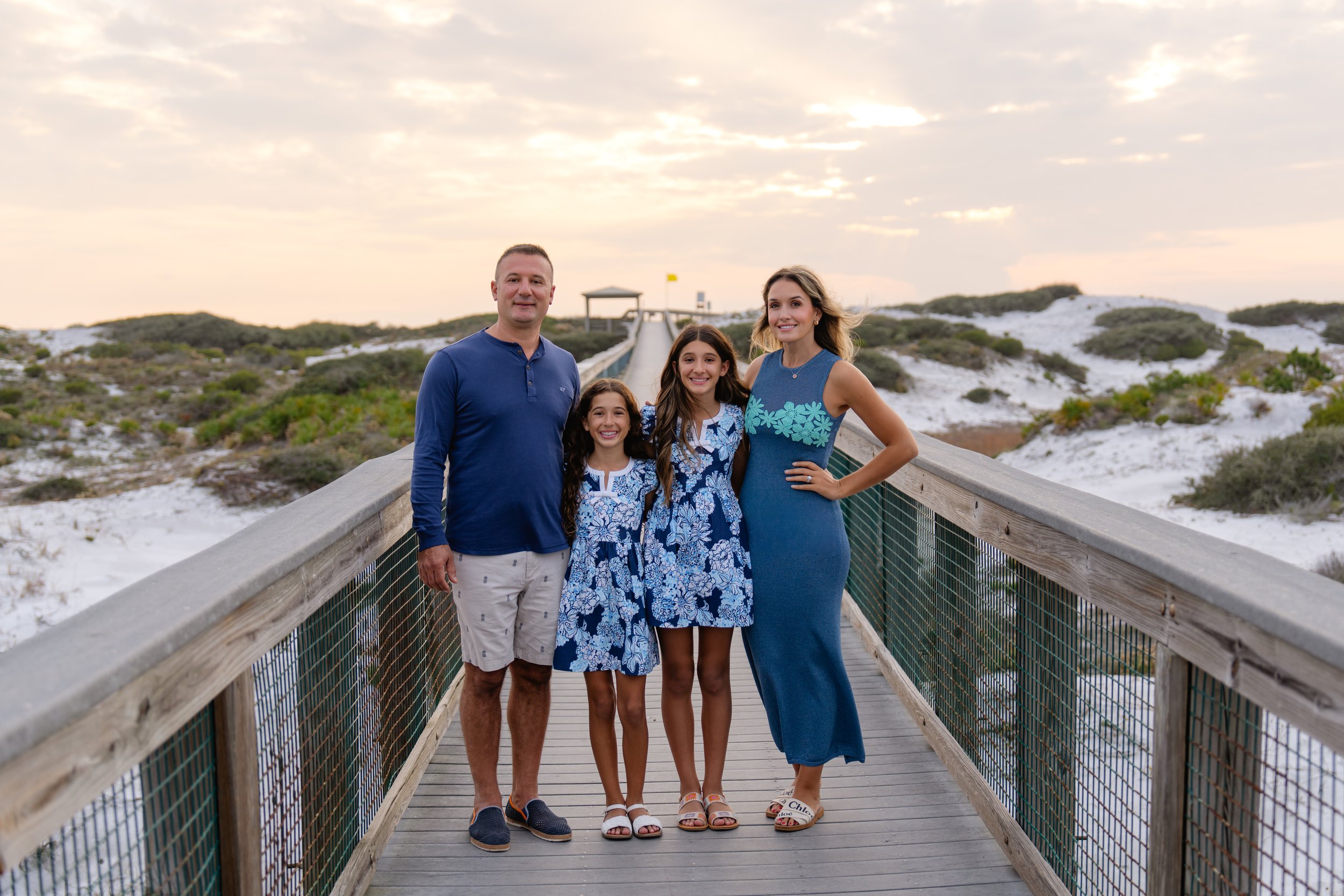 Family on board walk in Deer Lake State Park, Florida. 30A Photographer
