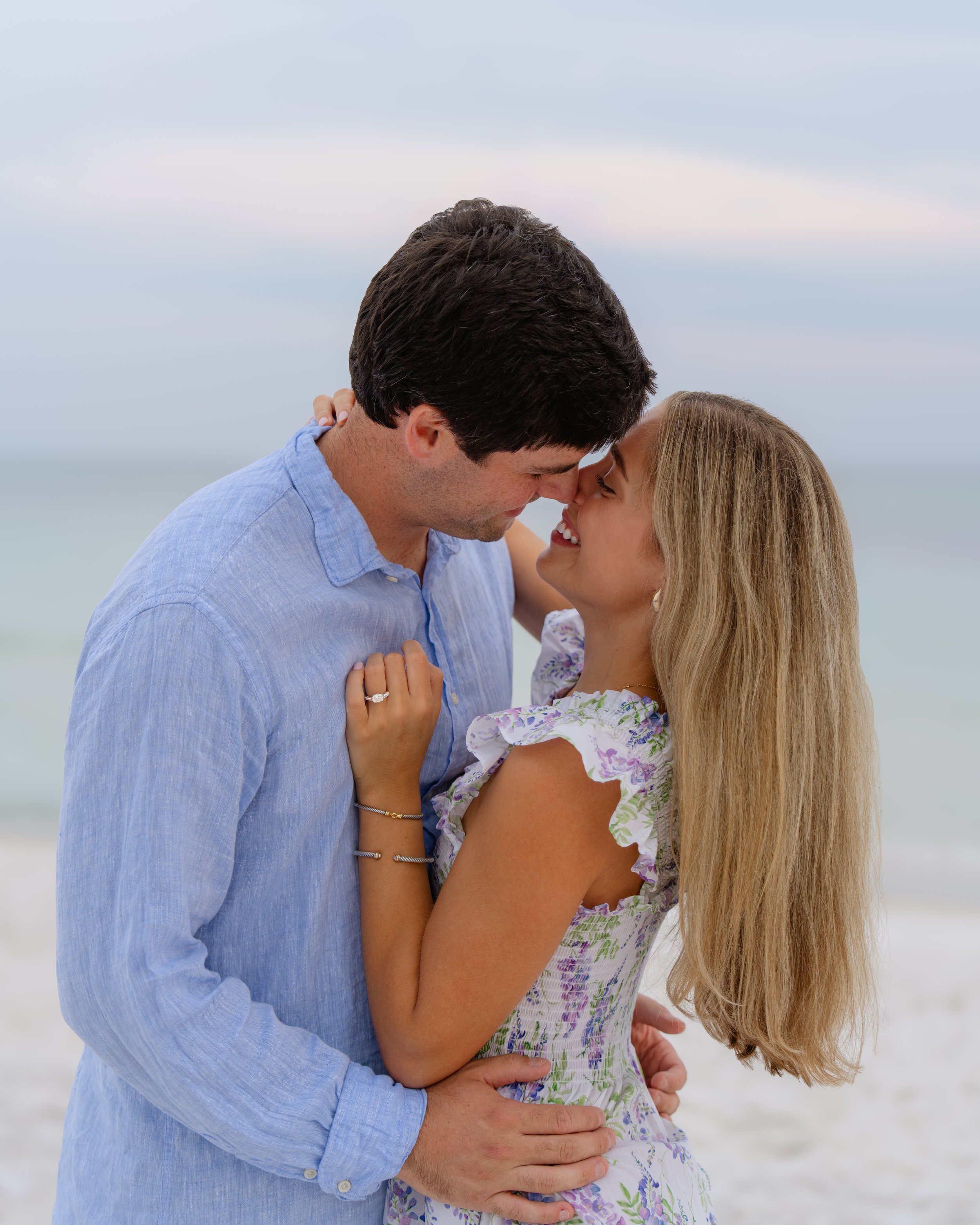 Man proposes a to woman on the beach in Seagrove, Florida. 30A Photographer 30A Engagement Photographer