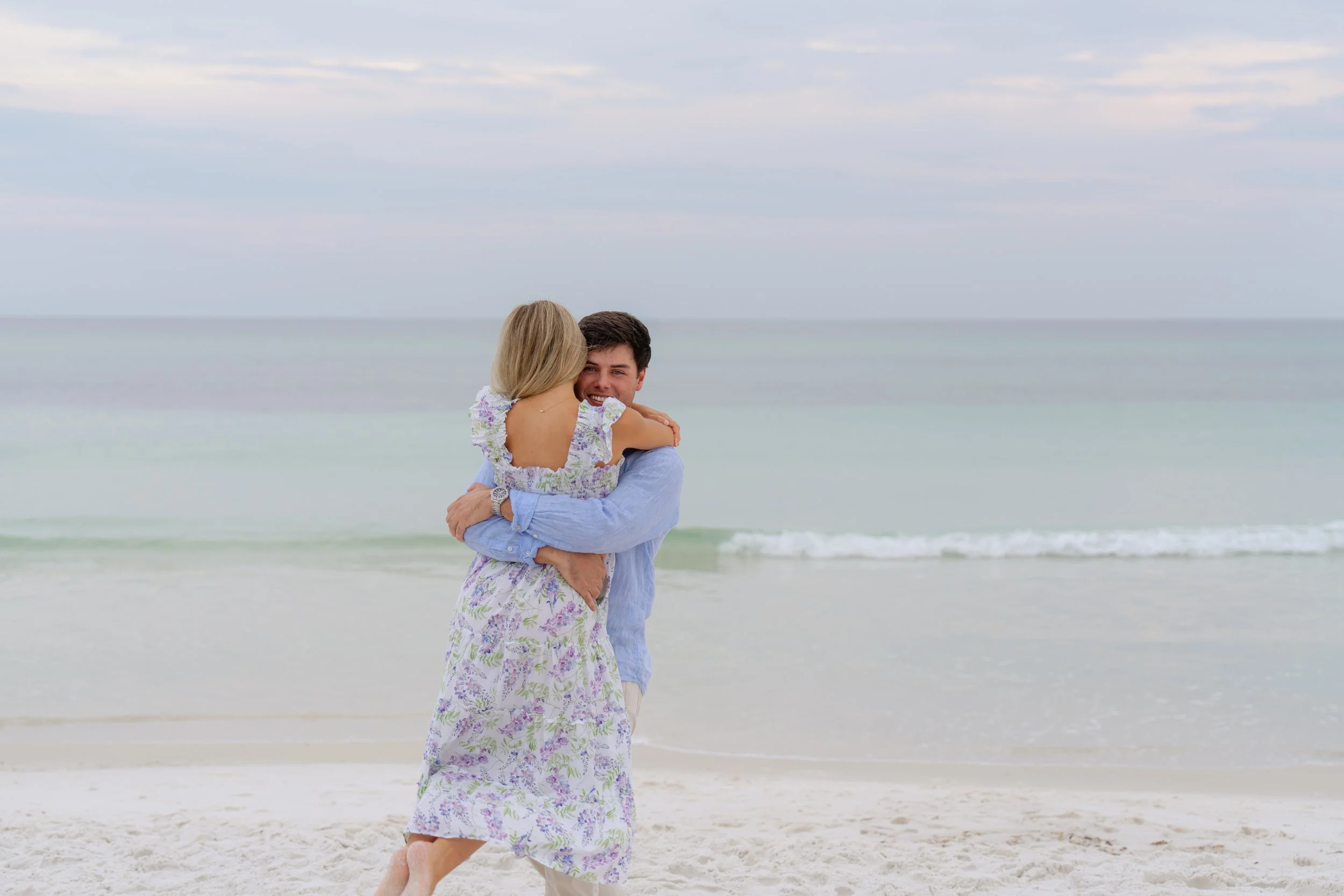 Man proposes a to woman on the beach in Seagrove, Florida. 30A Photographer 30A Engagement Photographer