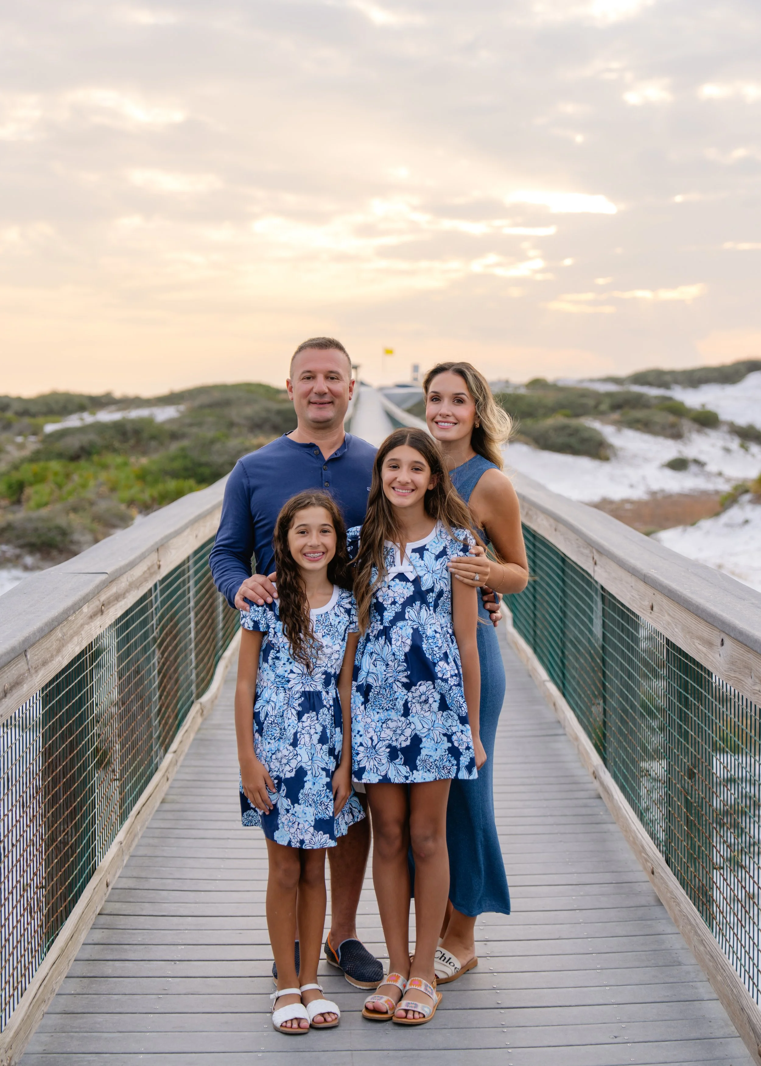 Family on board walk in Deer Lake State Park, Florida. 30A Photographer