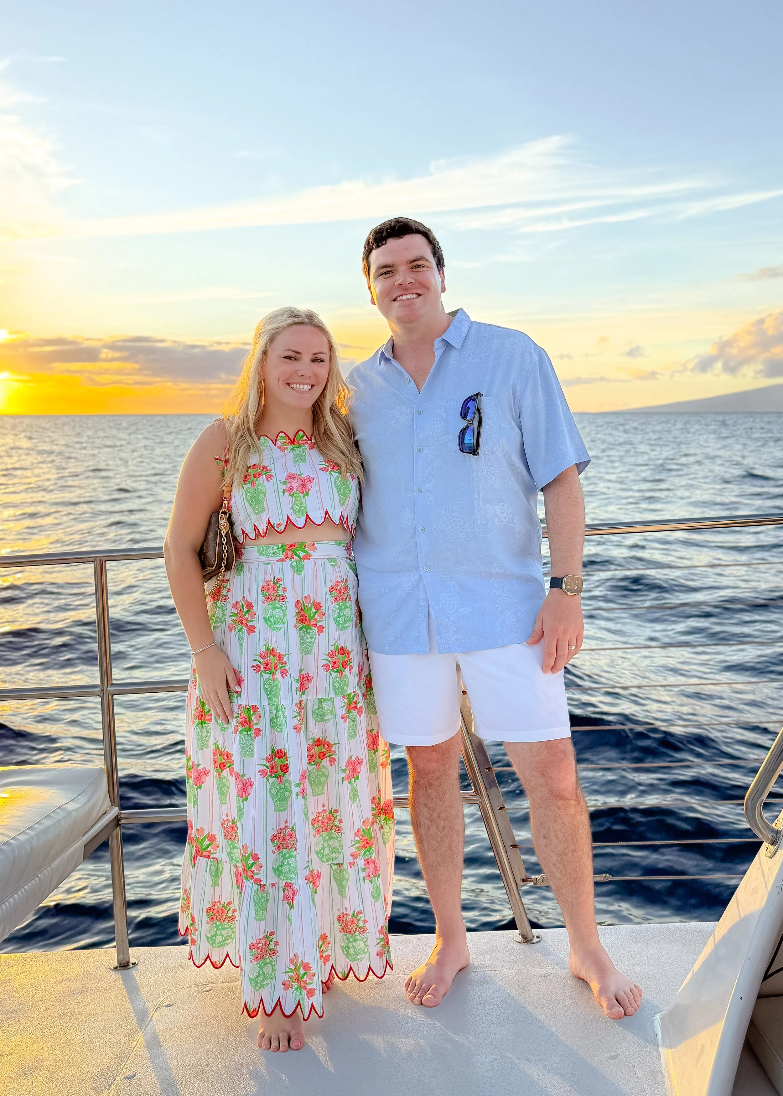 Man and woman on boat in the sunset