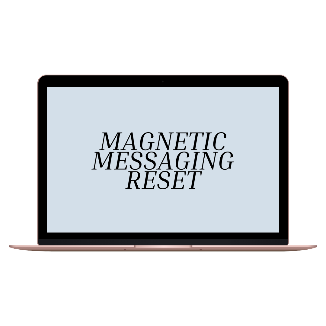 Laptop screen displaying the text 'Magnetic Messaging Reset' with a black background.