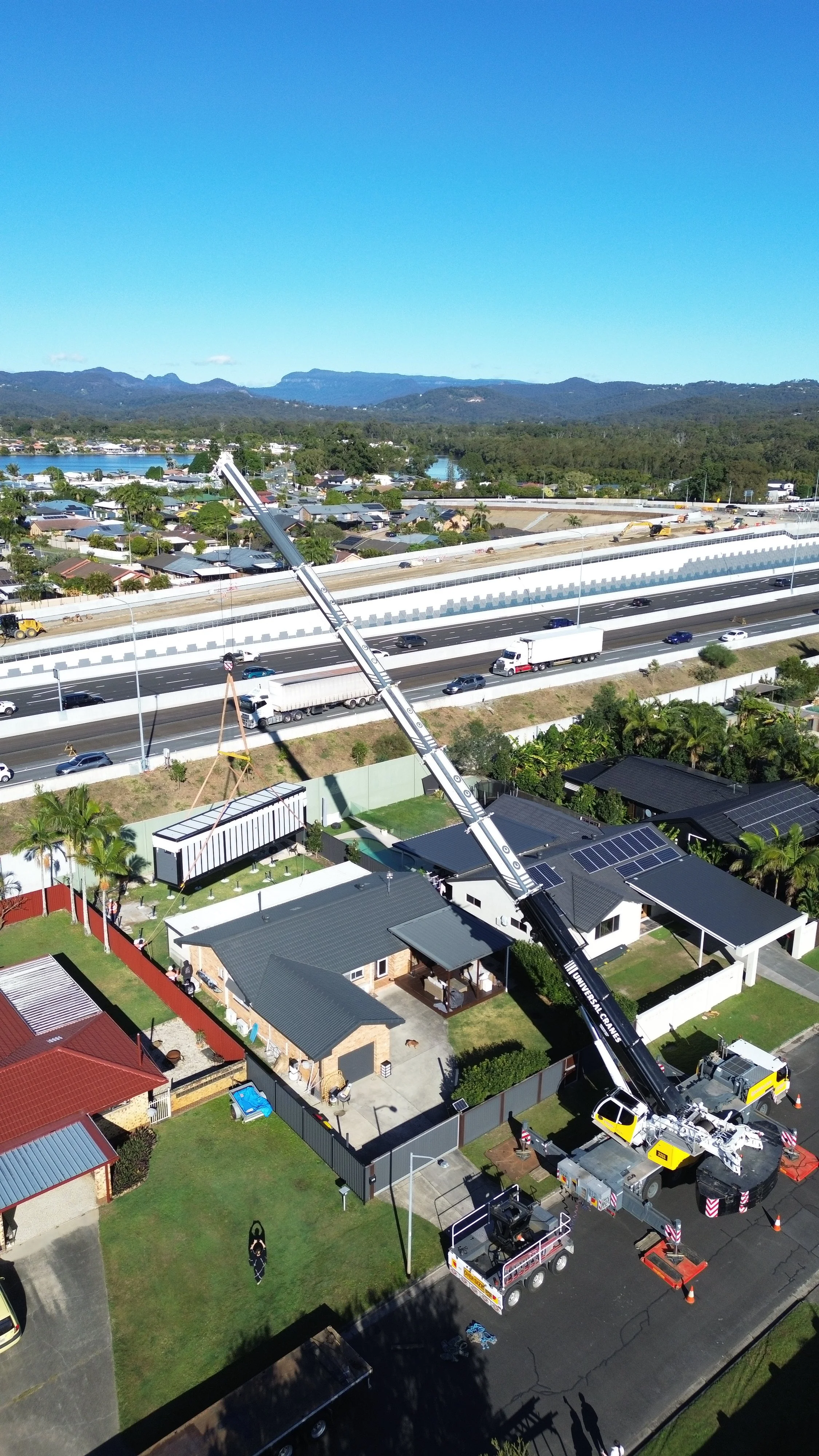 An image of a crane lifting a 40ft 270 Series modular home
