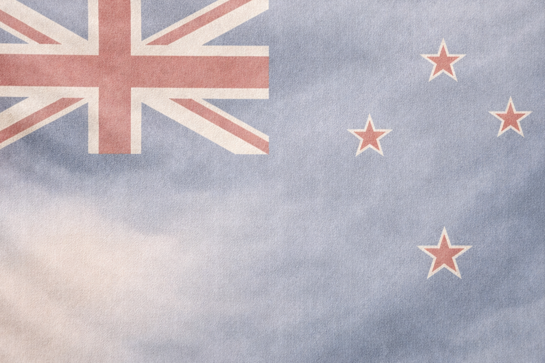 A flag of New Zealand and travellers.