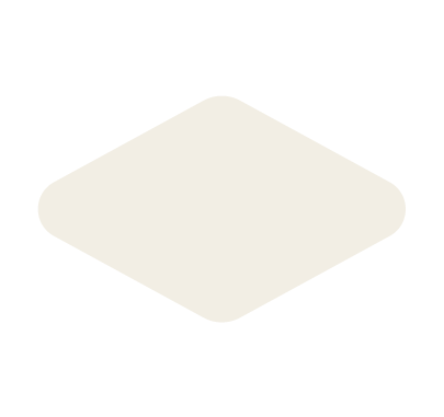 A white patterned tile with rounded edges on a black background.