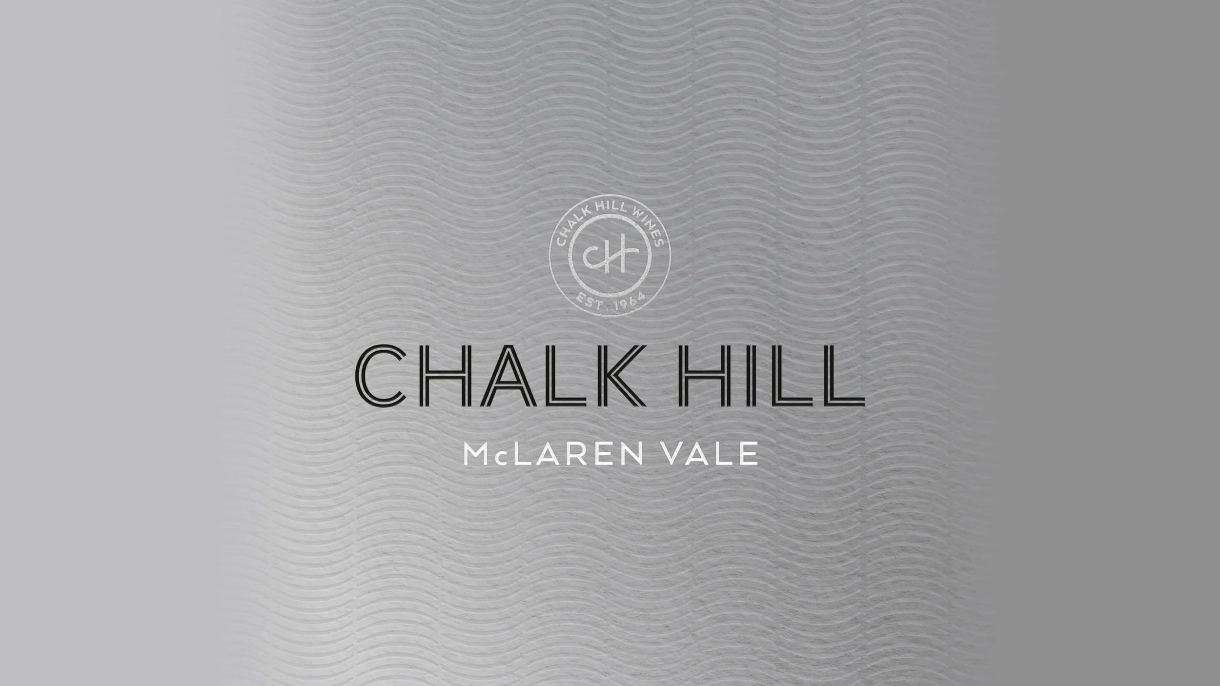Logo and text on a wine label for Chalk Hill by McLaren Vale. The background features a subtle, textured pattern.