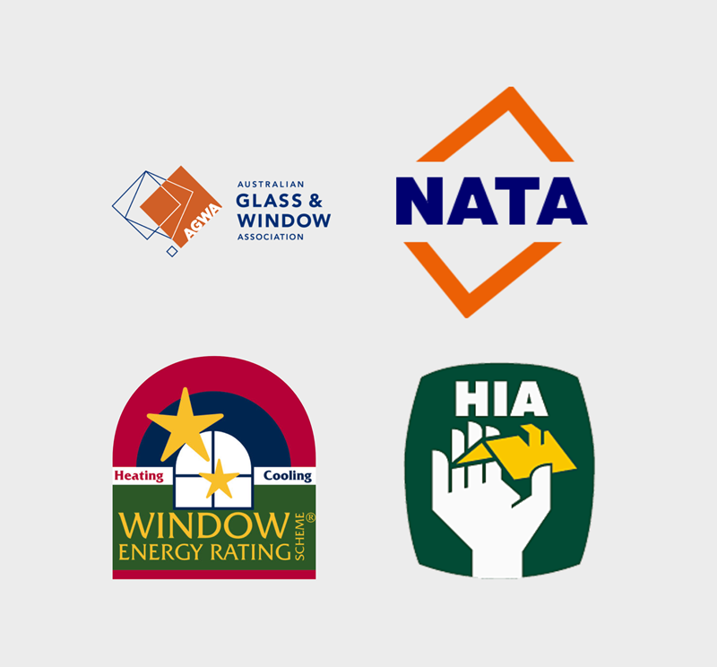 Four logos of different organizations related to windows, construction, and energy ratings. The top left logo is for the Australian Glass & Window Association, the top right is NATA, the bottom left is for window energy rating, and the bottom right is HIA.