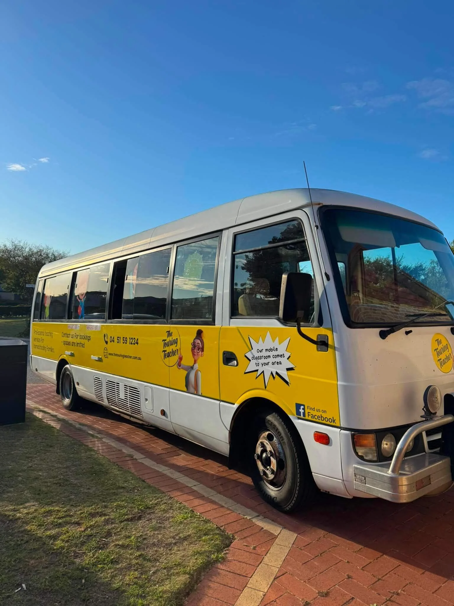 Bus in driveway compressed for website.jpg