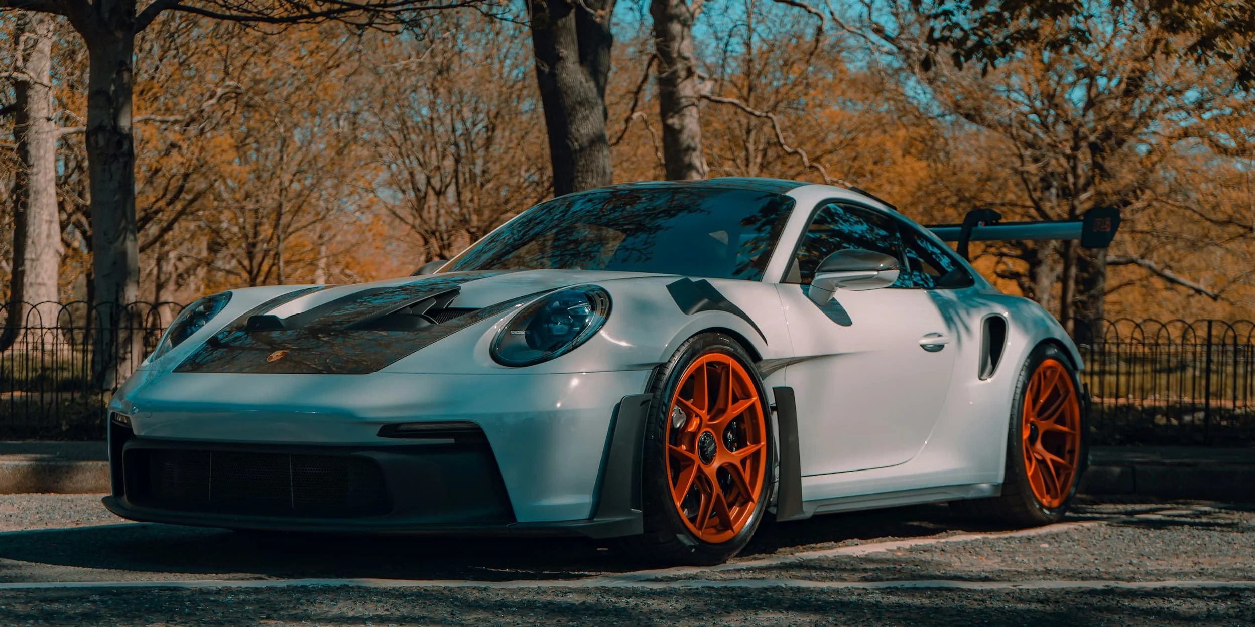 Porsche 911 GT3 RS parked outdoors, showcasing high performance design and aerodynamics for supercar buyers in Australia.