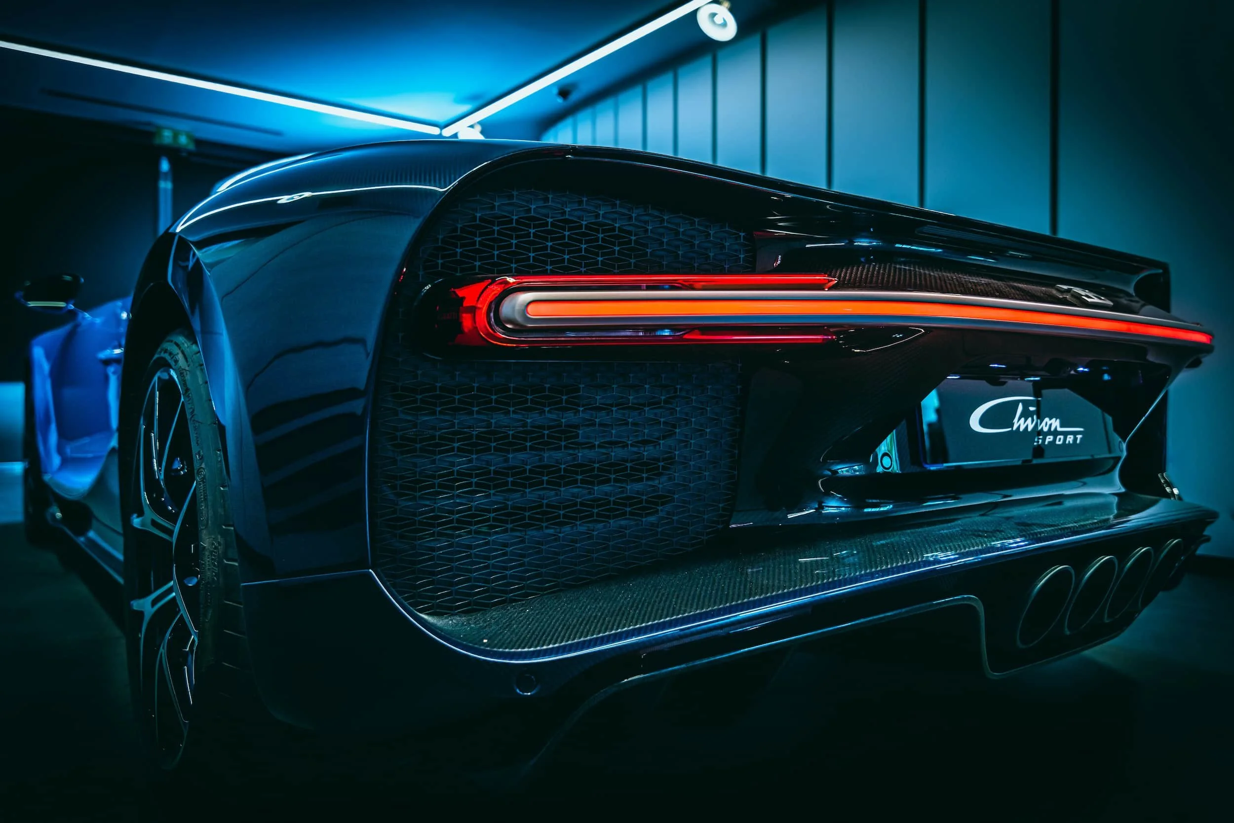 Rear view of a Bugatti hypercar, highlighting elite supercar ownership supported by specialist finance services.