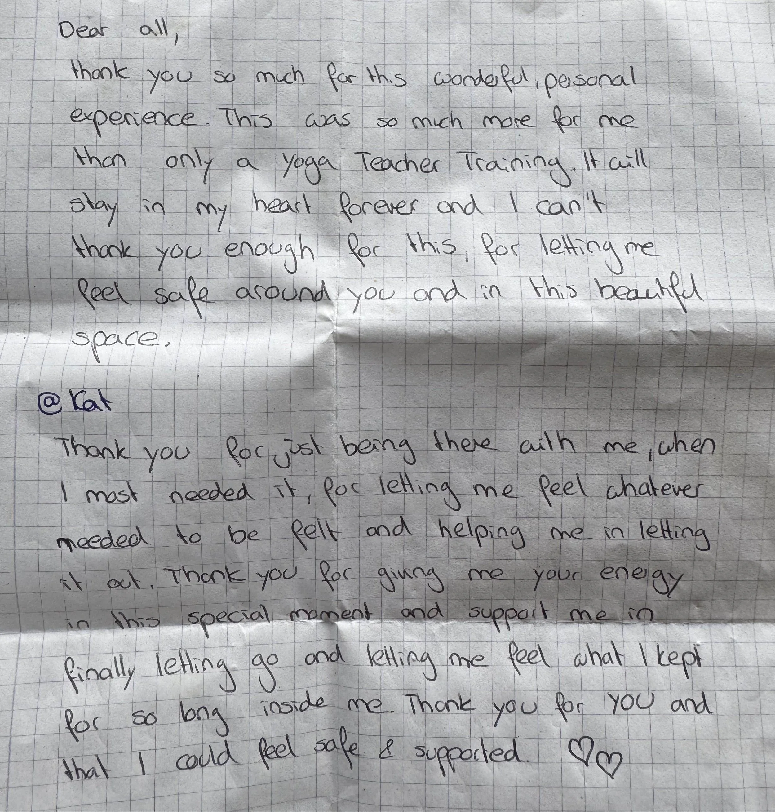 Handwritten letter on graph paper expressing gratitude and love, with hearts drawn at the end.