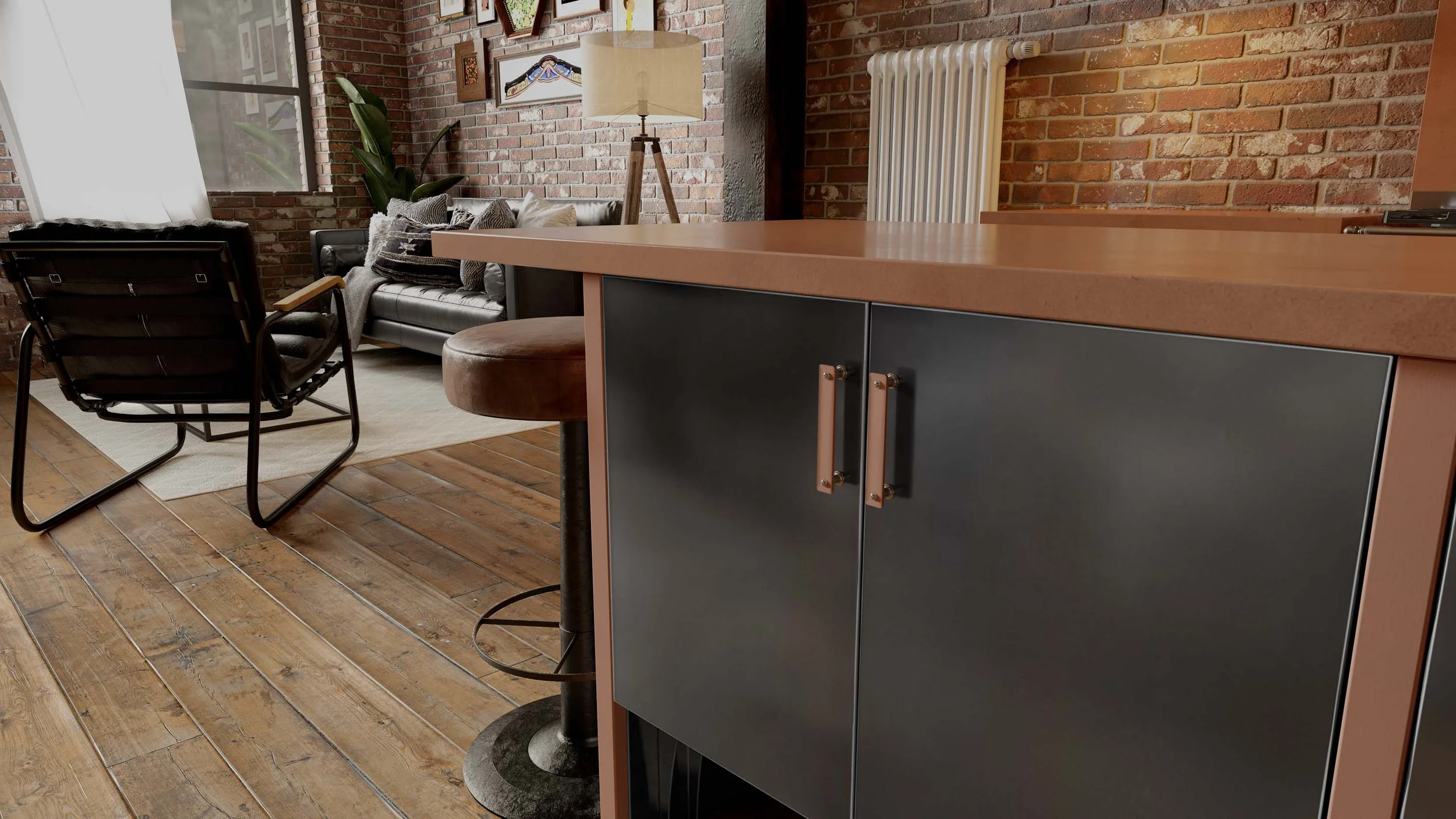 Copper-edged steel kitchen island connecting cooking and living spaces within an open-plan industrial interior.
