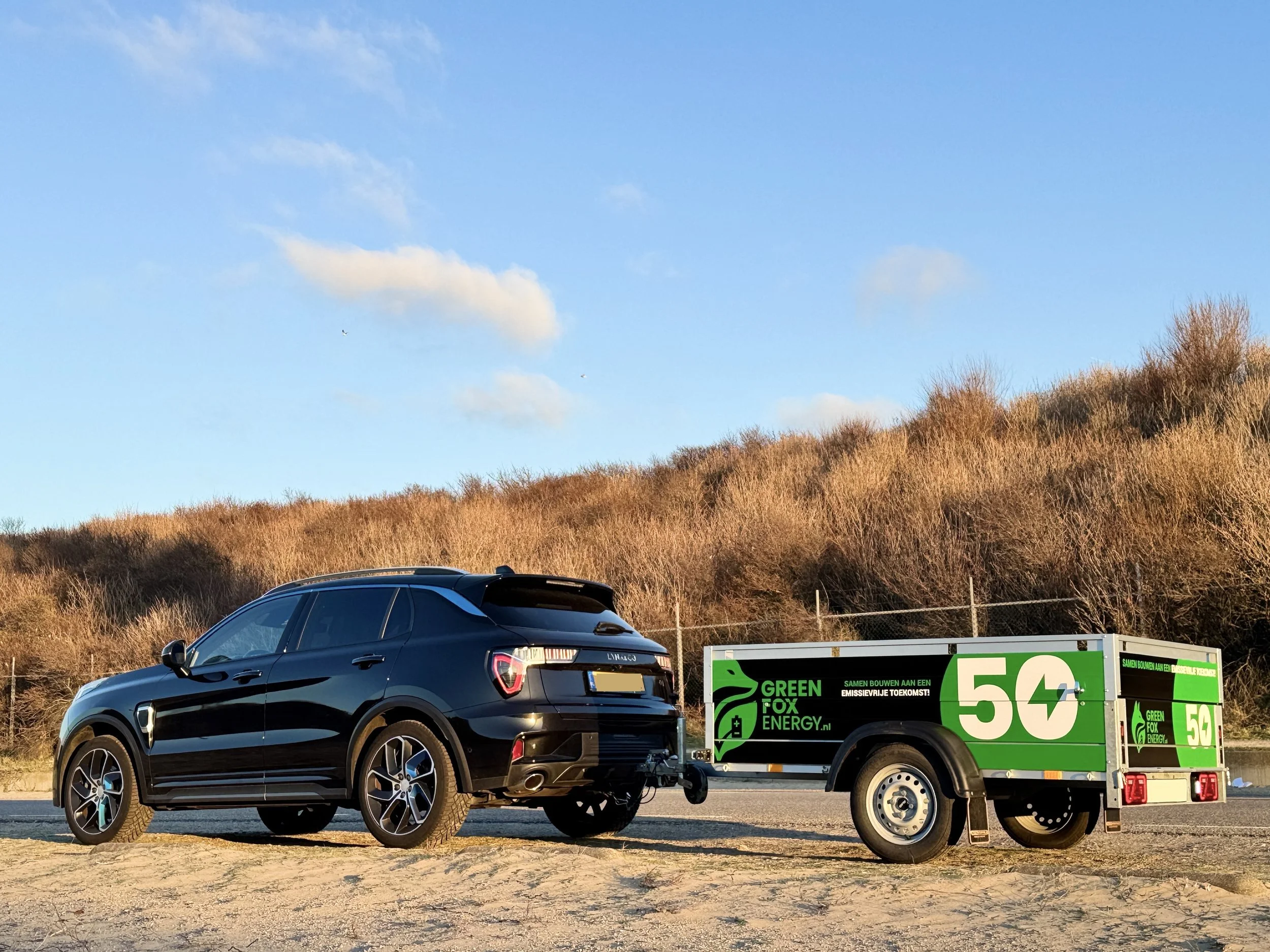 Auto en aanhanger met accu