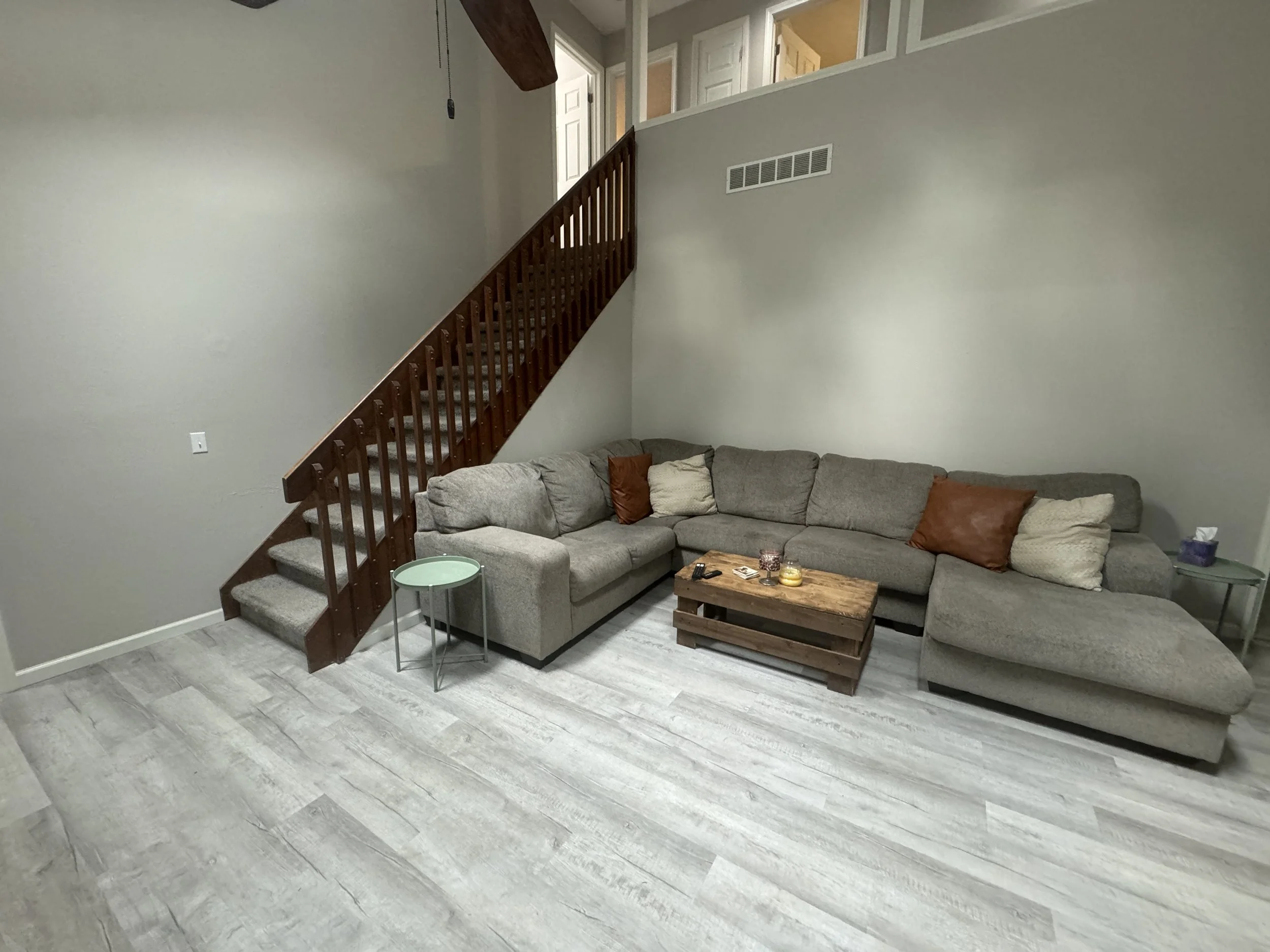 Before and after virtual staging comparison showing modern furniture and décor.
