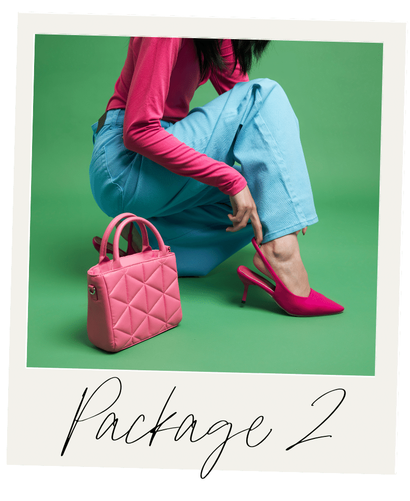 A person wearing a pink long-sleeve shirt, bright blue pants, and pink high-heeled shoes is sitting on the floor against a green background. A pink quilted handbag is placed next to them, and they are adjusting the strap of their shoe. The image is styled like a Polaroid with handwritten text that says "Package 2."
