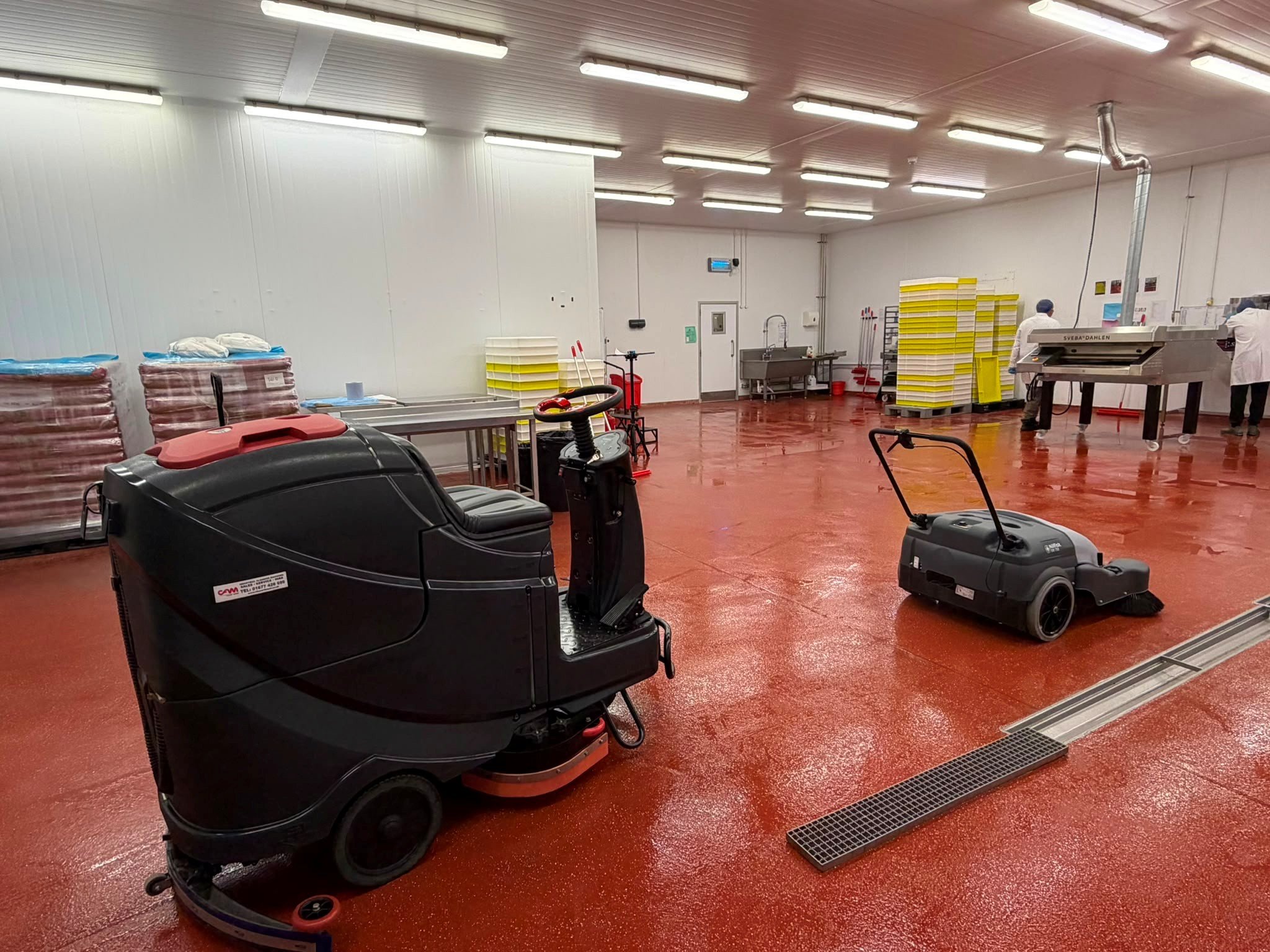 Viper AS710R Ride on Scrubber Dryer and a Nilfisk SW750 Pedestrian Sweeper