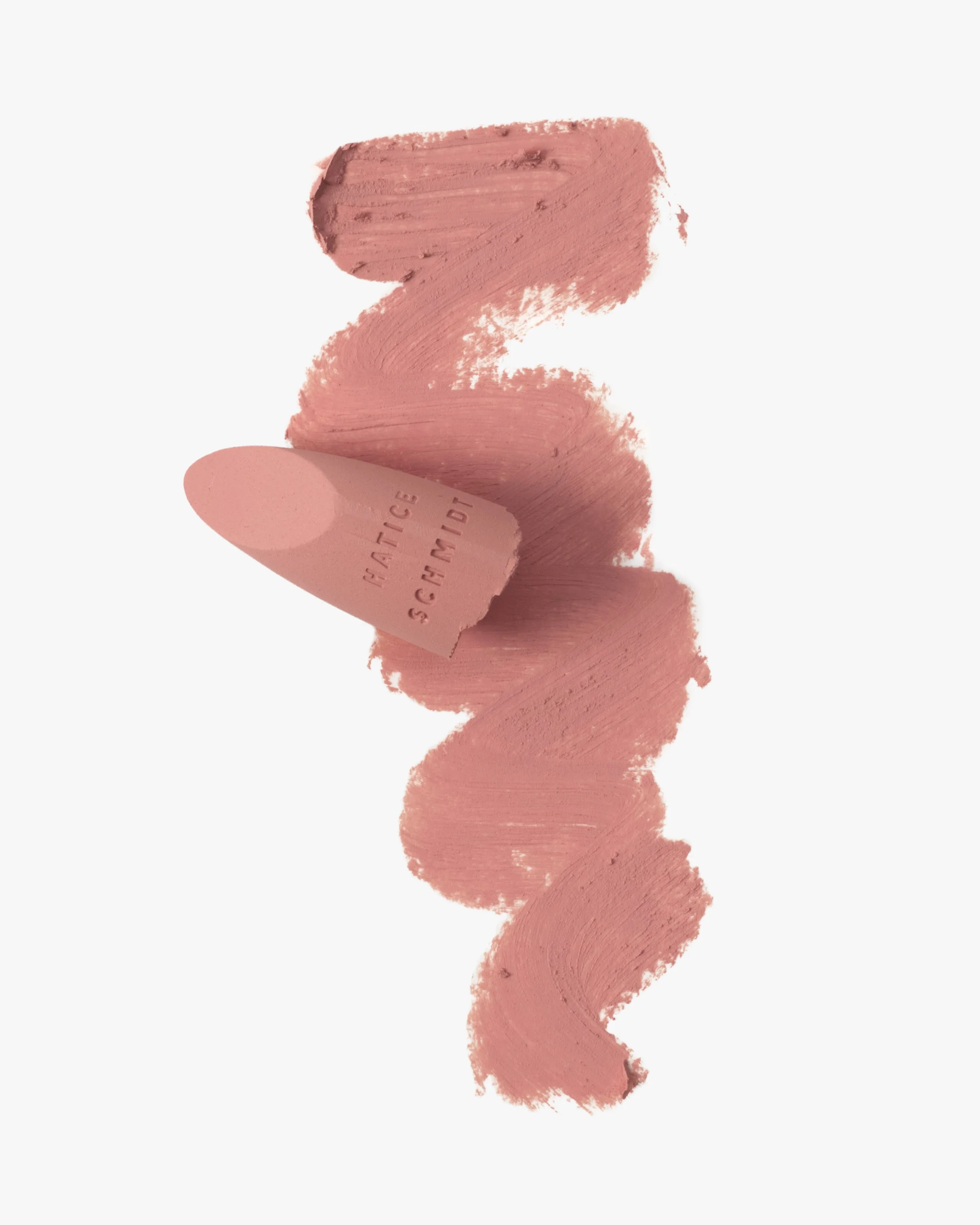 Swatch of pink makeup product with a sponge applicator labeled 'Facile Écologique.'