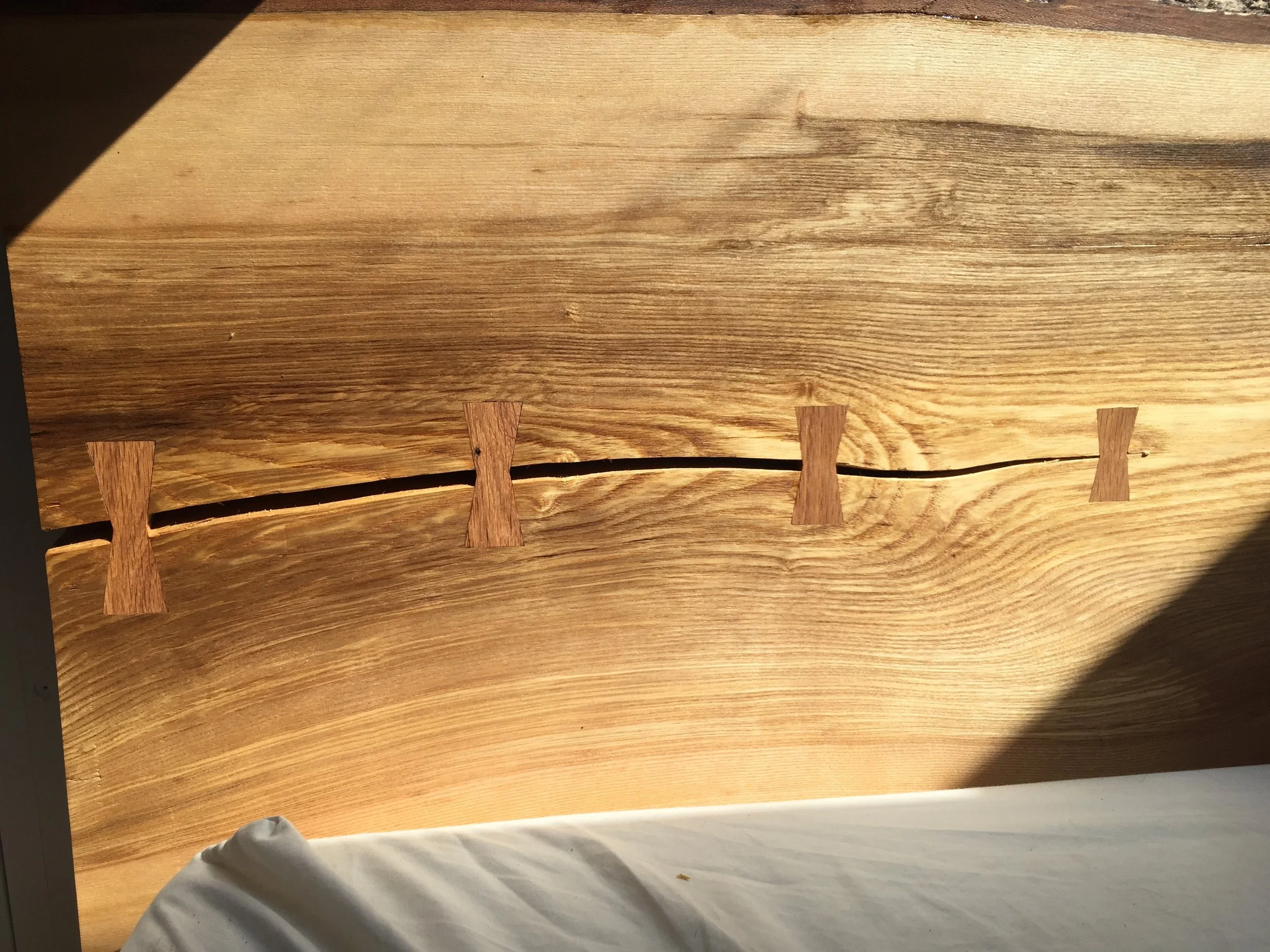 Oak bow-tie headboard
