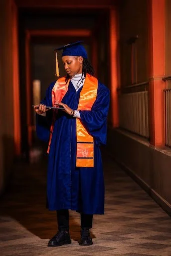 woman with graduation cap and gown
