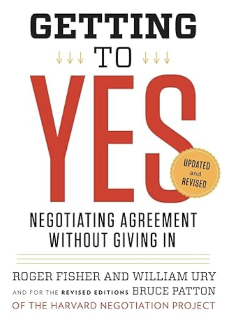 Book cover titled "Getting to Yes" by Roger Fisher and William Ury, with a badge indicating it is "Updated and Revised".