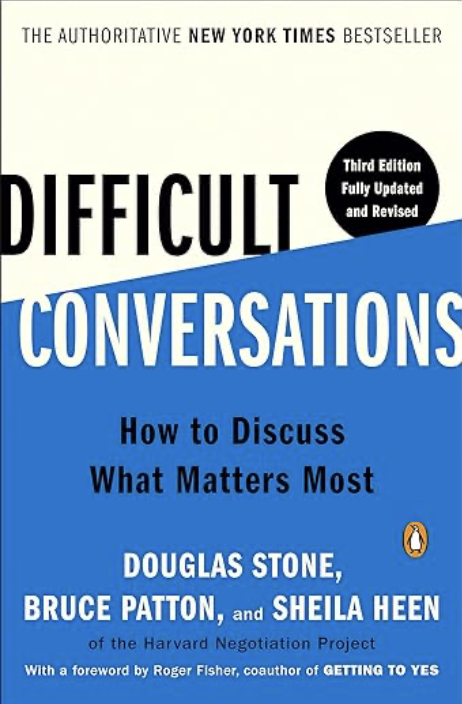 Book cover of 'Difficult Conversations: How to Discuss What Matters Most' by Douglas Stone, Bruce Patton, and Sheila Heen, with a foreword by Roger Fisher. The cover is predominantly blue and white, featuring black and white text.