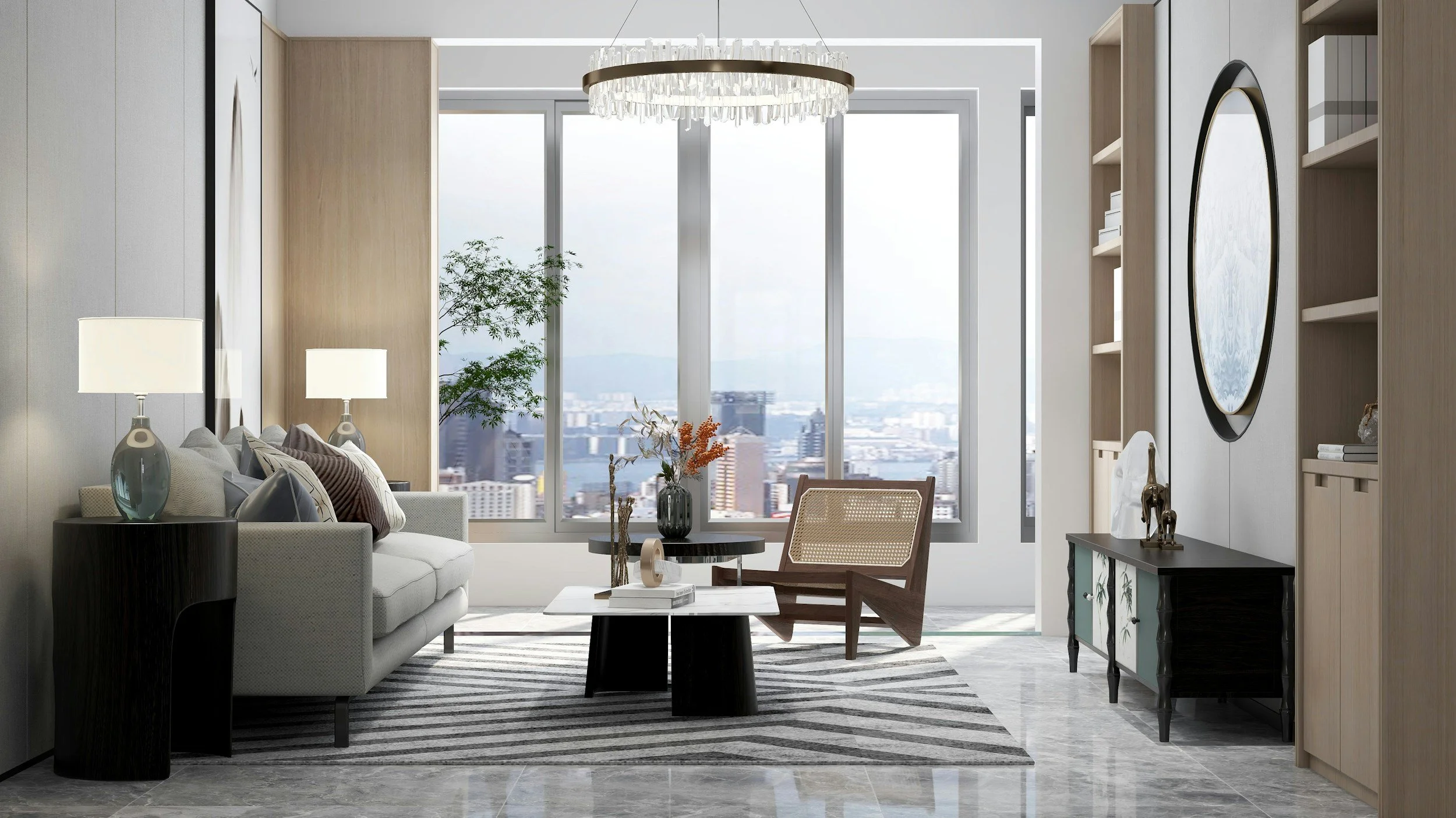 Modern living room with a large window view of the city skyline, beige walls, a white sofa with pillows, two white table lamps, a black side table, a round coffee table with decorative items, a wooden armchair, and built-in shelves with books and dec