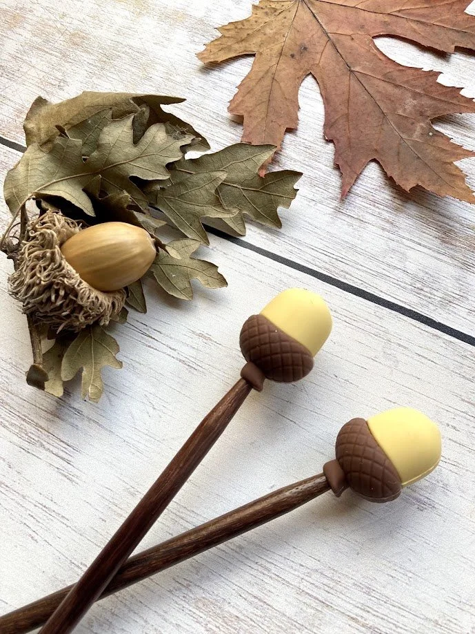Acorn needle huggers