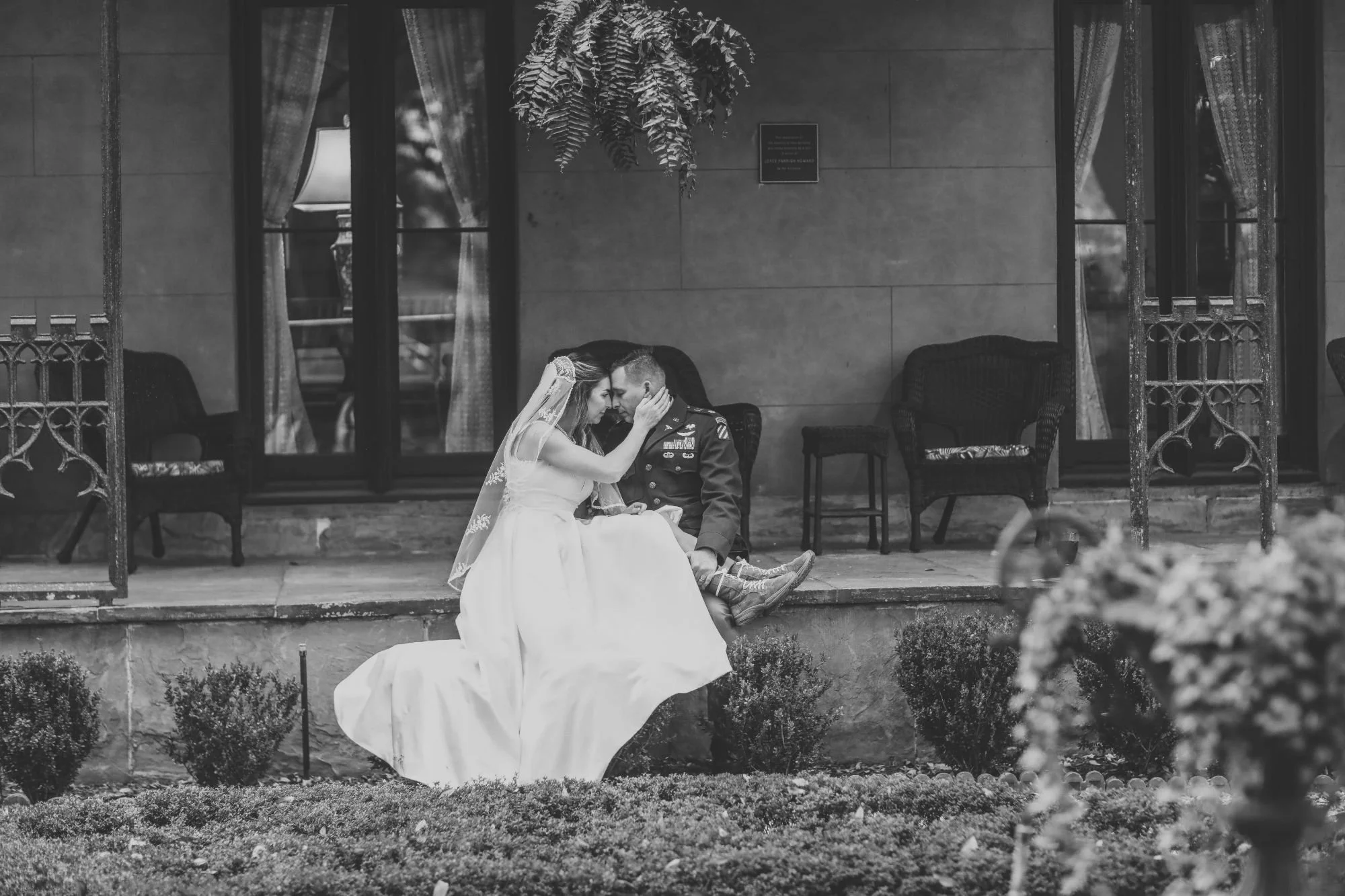 Bride and groom portrait featuring the bride’s Army boots during the Drouet–Plowman wedding in Savannah, Georgia