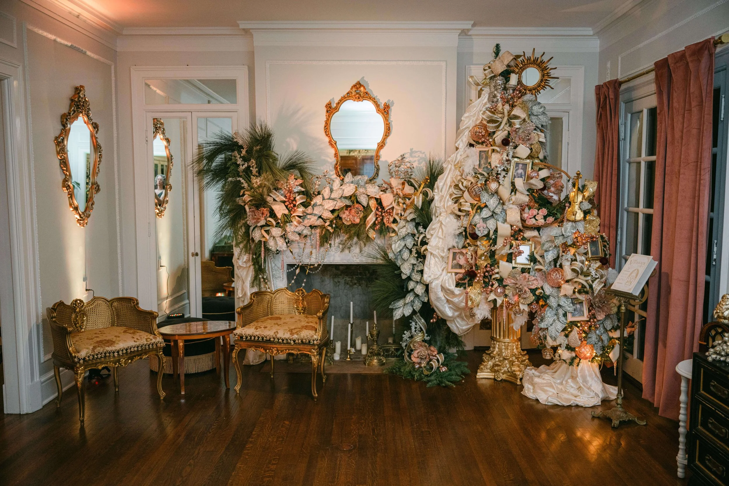 A holiday Christmas party in Savannah with luxe trees, gold accents, and vintage furniture